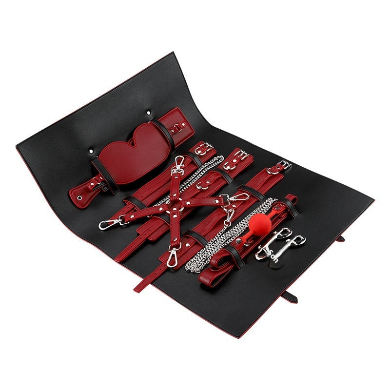 red leather bondage toy set with storage bag