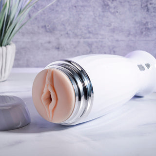 Zero Tolerance THE THRUSTING RECHARGEABLE STROKER  WHITE/CHROME 